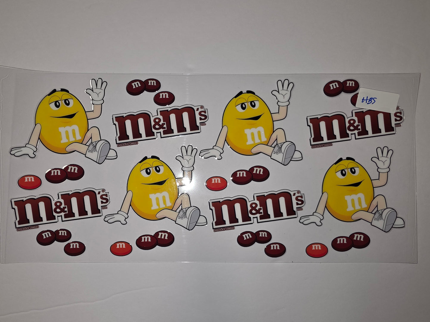 Yellow M&M Character & Logo Tumbler Wrap | Fun Candy Design for Cups