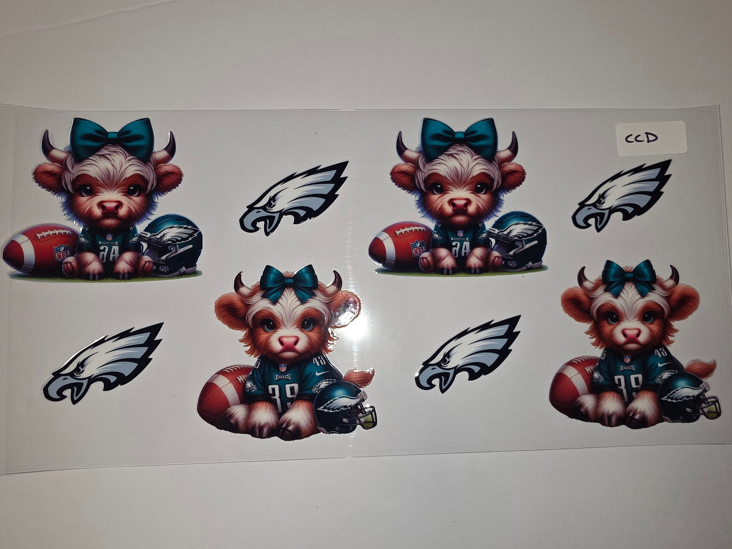 Cute Highland Cow Tumbler Wrap - Eagles Football Fan Design with Teal Bow